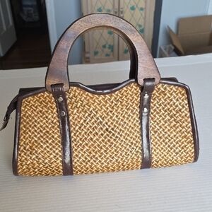 Brown Woven Handbag with Leather Accents. Wood Handles